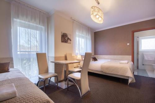 Posteľ alebo postele v izbe v ubytovaní Villa 33 Blisko Plaży