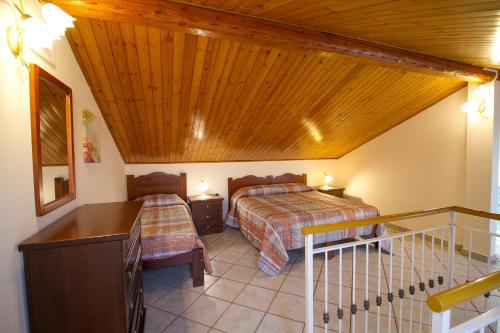 Postel nebo postele na pokoji v ubytování Etna Villa Alba Chiara