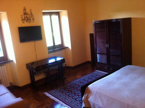 Postel nebo postele na pokoji v ubytování B&B Soiano Del Lago