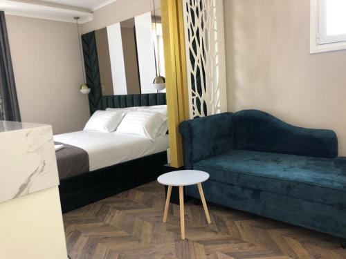 Katil atau katil-katil dalam bilik di Poda Boutique Hotel Ksamil