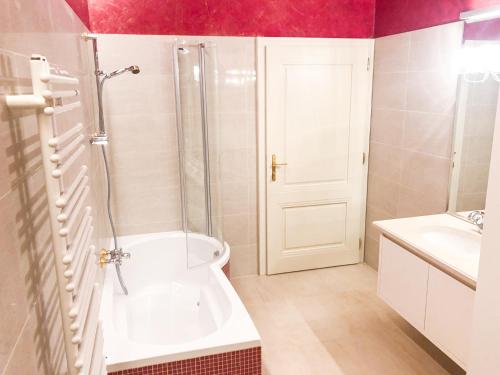 a bathroom with a shower and a toilet and a sink at Die Schmiede in Ybbsitz