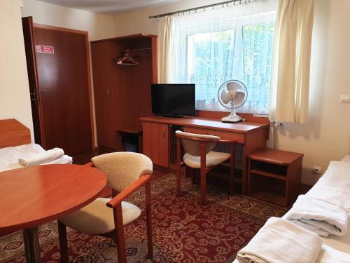 TV a/nebo společenská místnost v ubytování Motel Comet