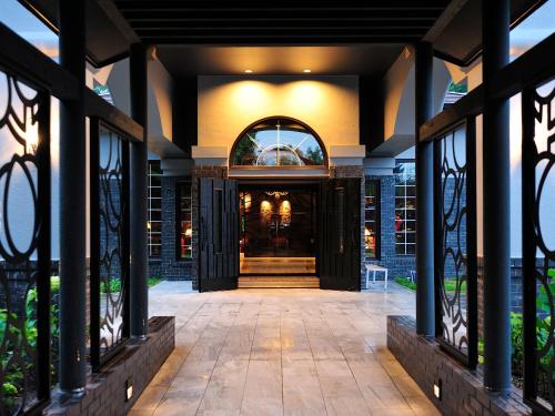 an entrance to a building with a doorway at Hakodate Onuma Tsuruga Resort EPUY- 30km from Hakodate Station in Hakodate