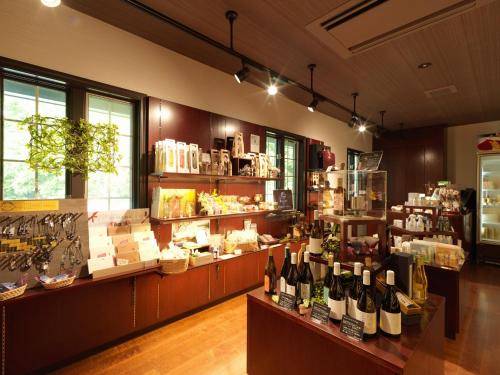 a store with bottles of wine on display at Hakodate Onuma Tsuruga Resort EPUY- 30km from Hakodate Station in Hakodate