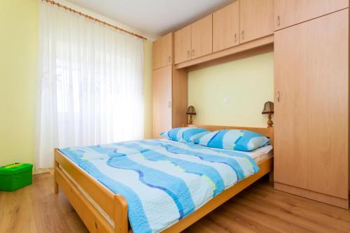 Voodi või voodid majutusasutuse Holiday apartment IVICA toas