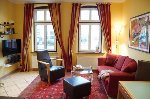 Un lugar para sentarse en Appartements-Seehues-Wohnung-Seestern