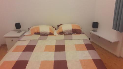 Postel nebo postele na pokoji v ubytování Apartment Piranhe