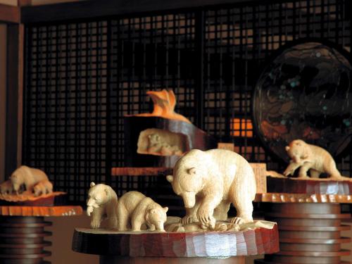 a group of figurines of animals on a table at Akan Tsuruga Besso Hinanoza in Akankohan