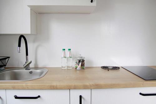 A kitchen or kitchenette at Apartament Flauta