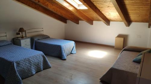 Ένα ή περισσότερα κρεβάτια σε δωμάτιο στο Casa Juanantonio