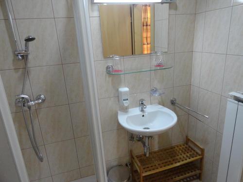 Koupelna v ubytování Rooms K