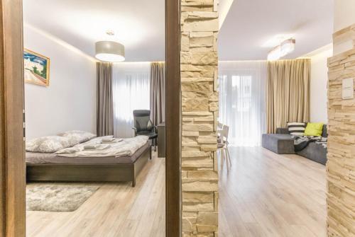 Ένα ή περισσότερα κρεβάτια σε δωμάτιο στο New Apartment
