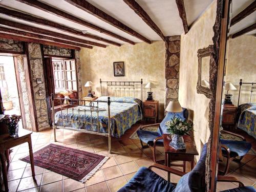 Katil atau katil-katil dalam bilik di Hotel Rural San Miguel - Only Adults