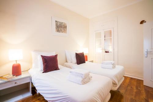 Uma cama ou camas num quarto em São Bento Authentic Apartment.