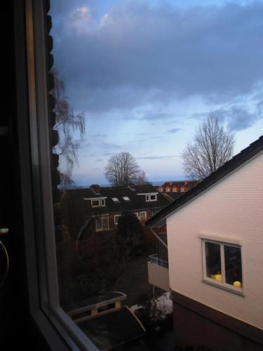 a view from a window of a building at Gästehaus Strandkonsulat in Scharbeutz