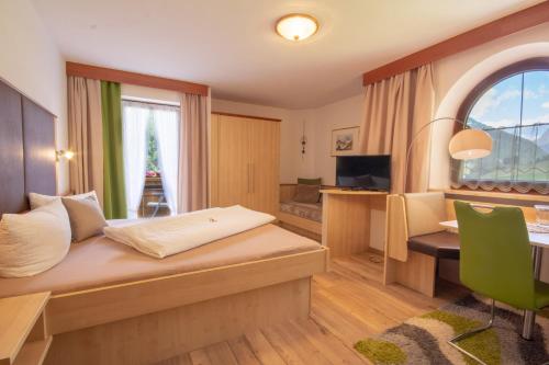 Кровать или кровати в номере Bella-Vista Apart Sölden