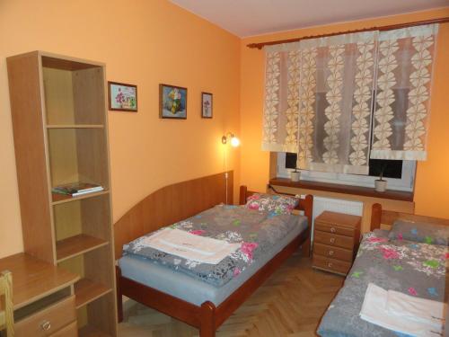 Postel nebo postele na pokoji v ubytování Nocleg w Łodzi - Flatta