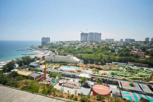 an aerial view of a amusement park next to the ocean at Gagarin Plaza Luxury Sea View Apartments in Odesa