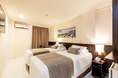 Postel nebo postele na pokoji v ubytování Bogari Hotel