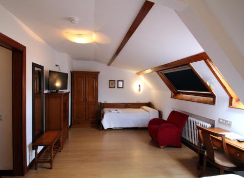 En eller flere senge i et værelse på Hotel Cabeza