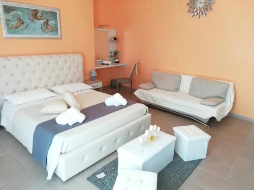 Postel nebo postele na pokoji v ubytování b&b MareSalento