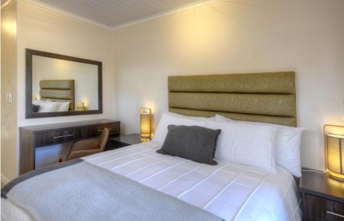 Ένα ή περισσότερα κρεβάτια σε δωμάτιο στο 9a@Crassula Way