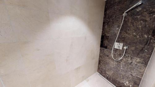 Ένα μπάνιο στο White Pearl Apartment 1.04