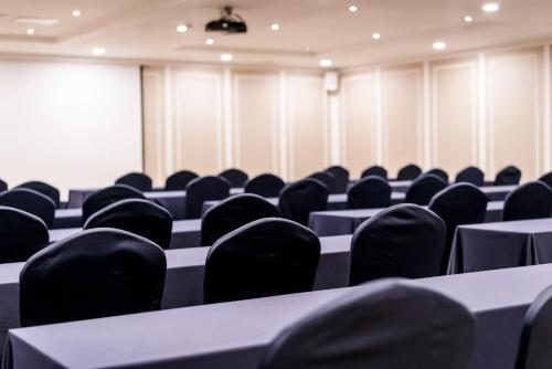 an empty conference room with chairs and tables at Hotel Atrium Jongno in Seoul