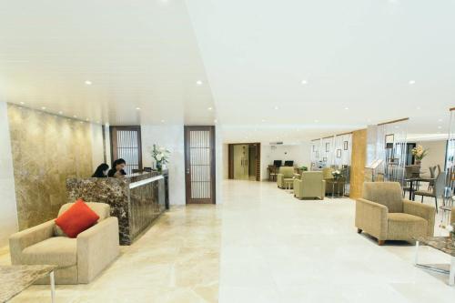 Ruang duduk di Thomson Hotel Huamark