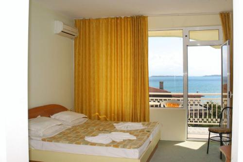 Кровать или кровати в номере Отель Панорама