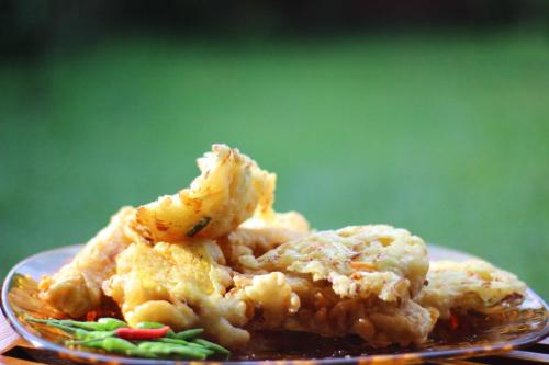 a plate of food on a table at Oemah Kajoe Lembang in Lembang