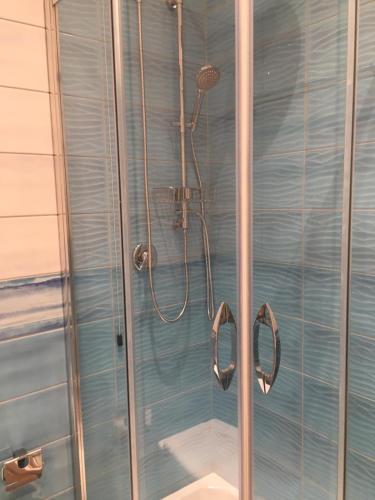 a bathroom with a shower with a toilet at La terrazza sul Duomo B&B in Salerno