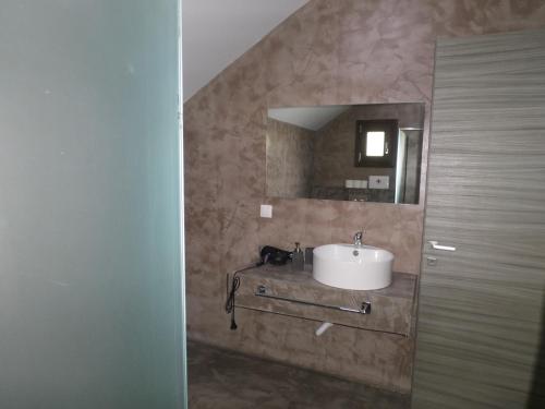 Ένα μπάνιο στο Armonia Apartment