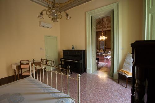 Katil atau katil-katil dalam bilik di Palazzo Leuzzi B&B