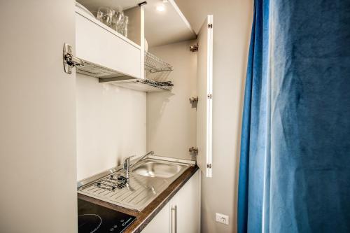 Et badeværelse på Maison d'Art Apartments - Maison d'Art Collection