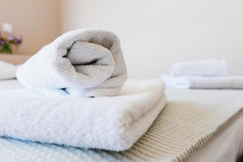 Postel nebo postele na pokoji v ubytování Phaedra Hotel