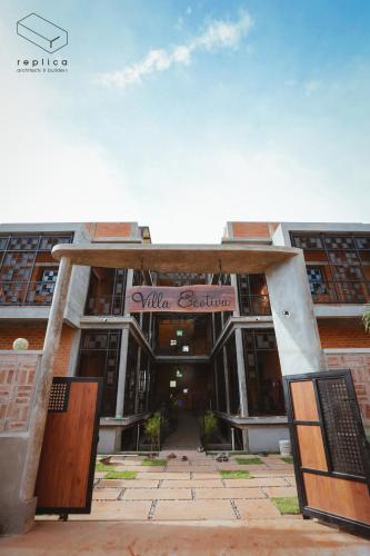an entrance to a building with an open door at Villa Ecotiva in Puducherry