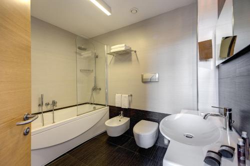 Koupelna v ubytování Grande Albergo Alfeo