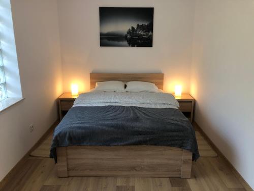 Un pat sau paturi într-o cameră la Pensjonat WiR na Kaszubach
