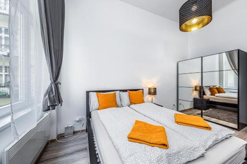 A bed or beds in a room at Precious Spot