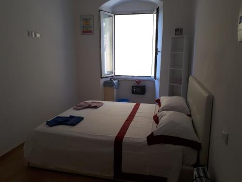 Posteľ alebo postele v izbe v ubytovaní Casa vacanze P&G. Colline, mare, relax