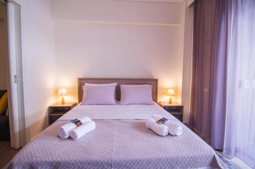 Ένα ή περισσότερα κρεβάτια σε δωμάτιο στο Comfort Mitropoleos Apartment