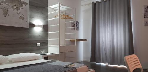 Ένα ή περισσότερα κρεβάτια σε δωμάτιο στο B&B Garosa
