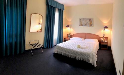 Katil atau katil-katil dalam bilik di Europalace Hotel Todi