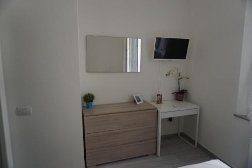 TV a/nebo společenská místnost v ubytování Le Tre Borghesi