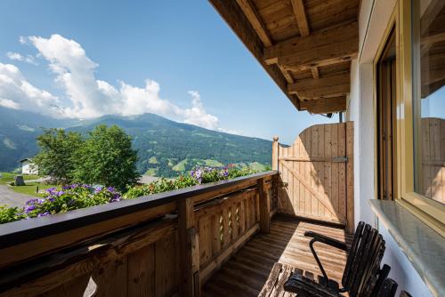 a balcony with a view of a mountain at Ferienpension Steiner in Weerberg