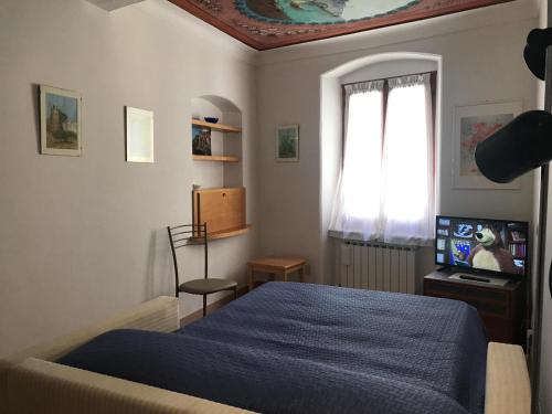 Postel nebo postele na pokoji v ubytování Ca' dei Nogi - Appartamento a Riomaggiore