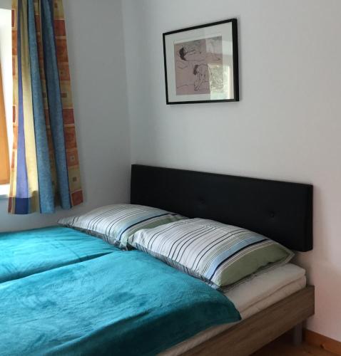 Appartement Kerschbaumerにあるベッド