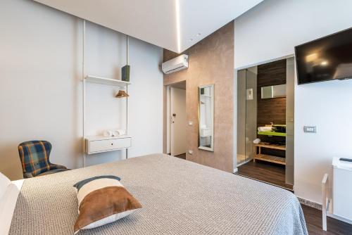 Cama o camas de una habitación en Sinestesia