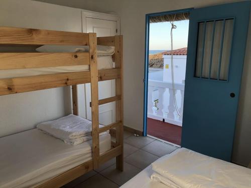 Posteľ alebo postele v izbe v ubytovaní El Chalet